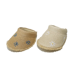Straw visor hats with daisy embroidery and fringed edges in khaki and creamy white colors