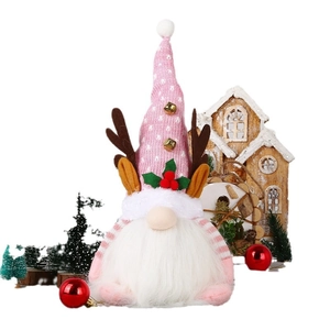 Lighted Christmas gnome doll with pink reindeer antlers and plush bells festive decor