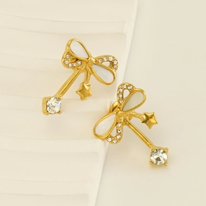 Sparkling gold bow earrings with crystal diamonds and star pendants for women
