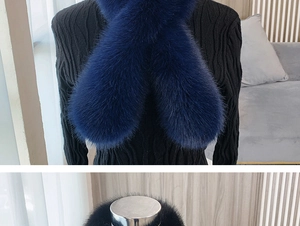 Detail of navy blue faux fox fur scarf showing plush texture and cross wrap style