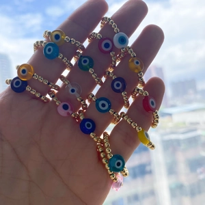 Handmade 18K gold-plated beaded rings with colorful evil eye charms for women