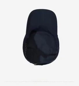 Detail view of the breathable lining and adjustable metal buckle on navy flat top cap