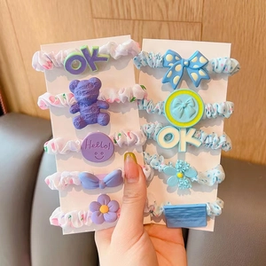 Cute kids elastic scrunchies set with bear and floral charms for gentle hair styling