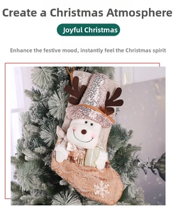 Detail view of a sequined Christmas stocking featuring a 3D cartoon reindeer on a tree