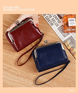 Detail of vintage burgundy and navy blue coin purses with silver metal kiss lock closure