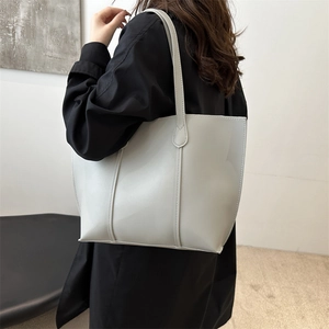 Minimalist large-capacity cream leather tote bag with vertical stitching for women