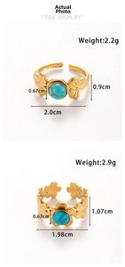 Detailed view of adjustable gold-plated stainless steel rings with tiger eye turquoise stones
