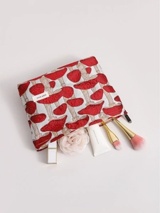 Retro mushroom jacquard makeup bag with zipper showing cosmetics and brushes