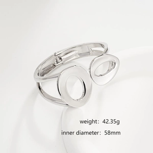 Detail showing 58mm inner diameter and 42.35g weight of silver irregular cuff bracelet