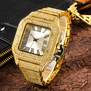 Macro detail of luxury gold-plated square watch with paved diamonds and Roman numerals