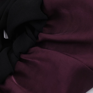 Elegant British style satin blouse for women featuring smooth texture and balloon silhouette