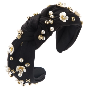 Serre-tête baroque noir avec fleurs blanches, perles et strass au design noué