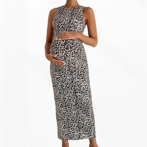 Detail shot of sleeveless maternity maxi dress with bold leopard print and slim fit cut