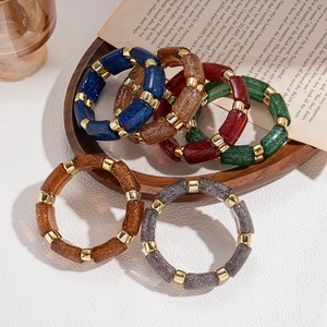 Bohemian acrylic geometric beaded bracelets with glitter finish and gold accents