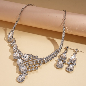 Elegant silver teardrop crystal necklace and earrings set for formal banquet wear