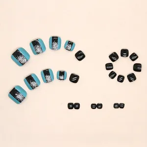 Lake blue and black glitter press-on toenails with glossy finish and silver accents