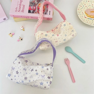 Detail of cartoon lace canvas bags with embossed texture and floral bow patterns