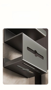 Detail of grey aluminum wall shelf with matte finish and drainage slots for bathroom storage