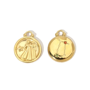 Macro detail of 14K gold-plated stainless steel Gemini zodiac pendant with inlay gems
