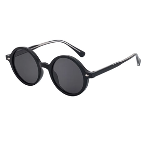 Classic black round frame sunglasses for women with a glossy finish and retro fashion style