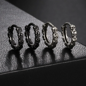 Punk style skull hoop earrings in vintage silver and black finish for a gothic hip hop look