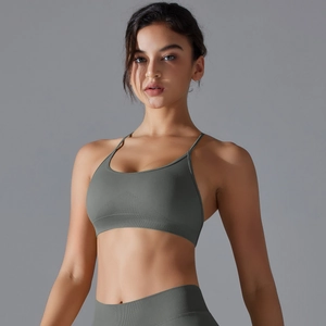 Deep grey-green seamless yoga set with racerback sports bra and high-waisted leggings