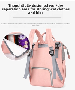 Detail of the waterproof rear dry-wet separation pocket on the pink Oxford diaper backpack