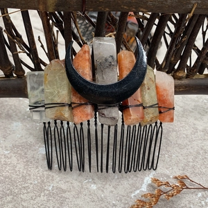 Macro detail of natural amethyst crystals and black moon on a handmade bridal hair comb