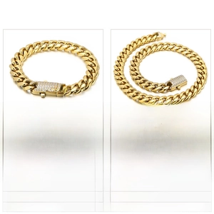 Detail of gold Cuban link chain set with sparkling rhinestone buckle for hip hop style
