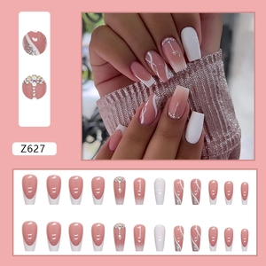 Sparkly white French press-on nails with glitter lines and rhinestones, square shape