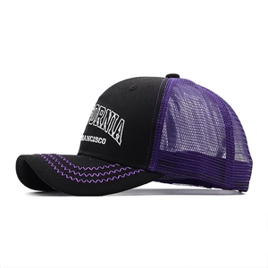 Detail of California and San Francisco 3D embroidery on black and purple mesh trucker hat