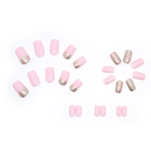Pink and glittery gold gradient fake nails in mid-length square shape for women