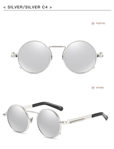 Detail view of steampunk round silver metal sunglasses with mechanical frame and black tips