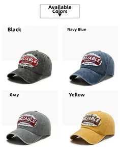 Detail of multi-colored washed cotton baseball caps with RELIABLE vintage embroidery