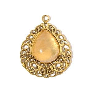 Detailed view of hollow gold-plated teardrop pendant with translucent yellow tiger eye stone