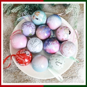 Festive round tin wedding favor boxes with colorful patterns on a rustic wooden table