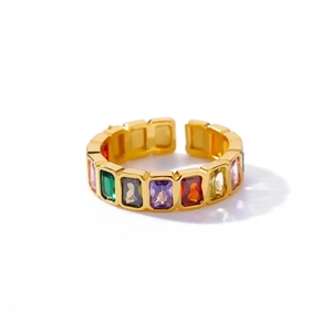 Detail of gold-plated open ring featuring rectangular rainbow cubic zirconia stones