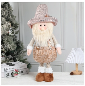 Detail of champagne gold Christmas gnome with sequins hat and plush beard decor