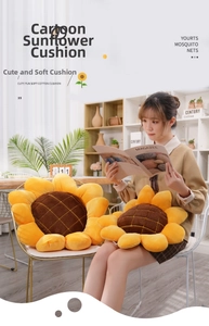 Detail of soft sunflower plush cushion showing textured fabric petals and cozy home setting