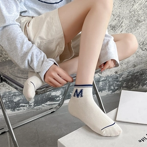 Women's cotton ankle socks with blue M embroidery and striped accents in beige