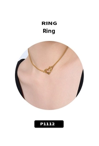 Detail of 18k gold plated irregular liquid heart pendant on a delicate chain necklace