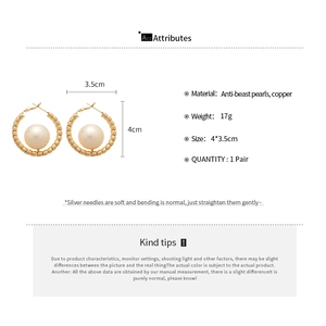 Detailed view of 4cm gold plated hoop earrings with central pearl and dimensions