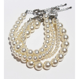 Elegant multi-layer cream pearl necklace and bracelet set with silver lobster clasp