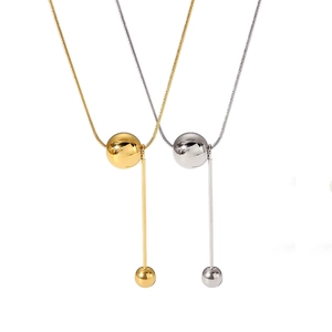 18k gold and silver plated ball pendant necklaces with snake chains on white background