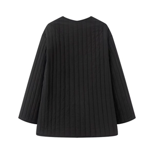 Back view of a black quilted jacket with vertical stitching and minimalist loose fit design