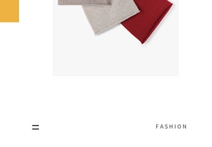 Vue détaillée de la maille et du bord à chevrons en rouge, beige et gris