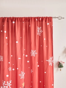 Detail of red Christmas snowman curtain with white snowflake patterns and jacquard texture