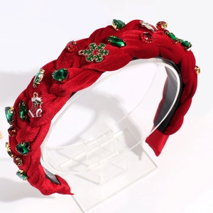 Detail of red velvet braided headband with rhinestones, Christmas stockings and snowflakes