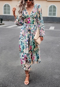 Detail shot of the floral print V-neck maxi dress featuring delicate lace trim accents