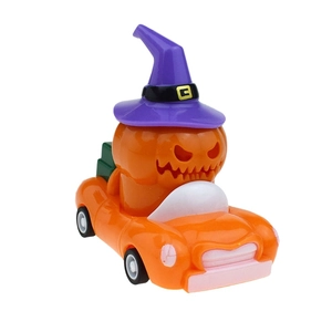Detail of Halloween pumpkin pull-back car with a purple wizard hat and orange body
